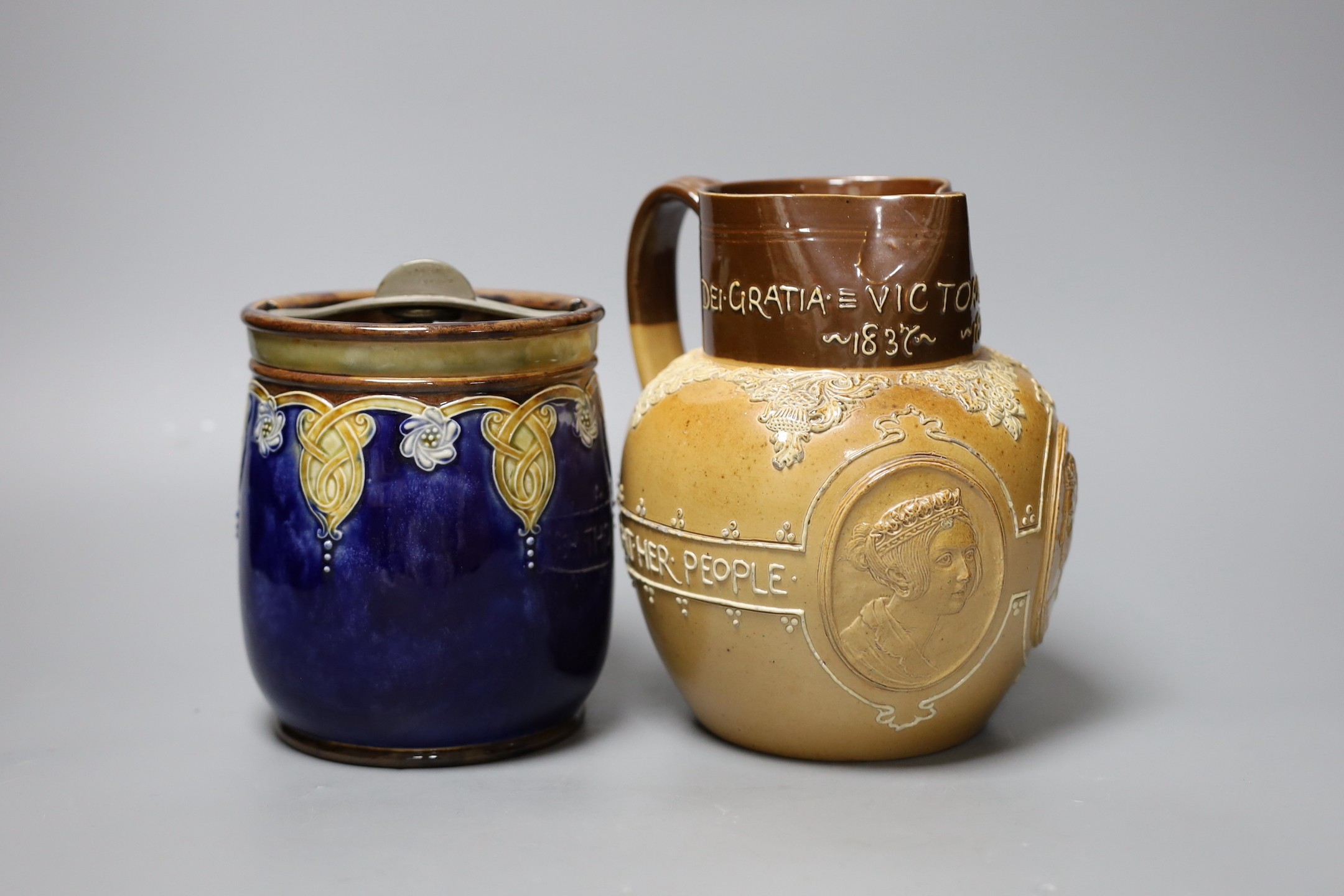 A Doulton Lambeth stoneware tobacco jar and a Queen Victoria Diamond Jubilee commemorative jug, jug 19cms high